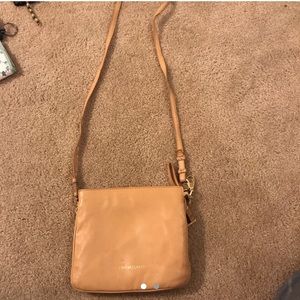 beige crossover purse